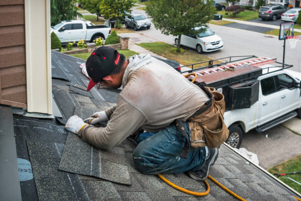 Professional Roof Replacement technician working in Hunter, ND